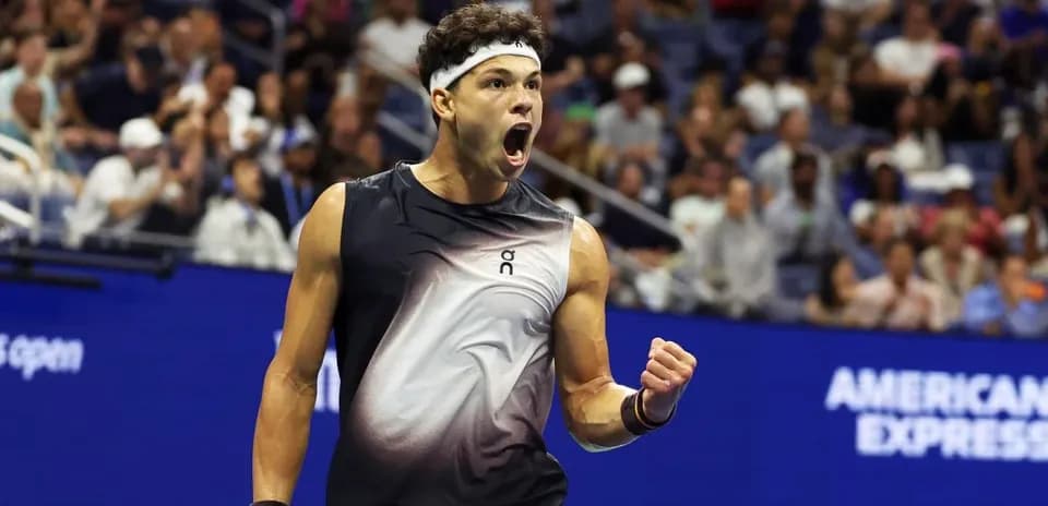 Joueur de tennis célébrant une victoire au US Open