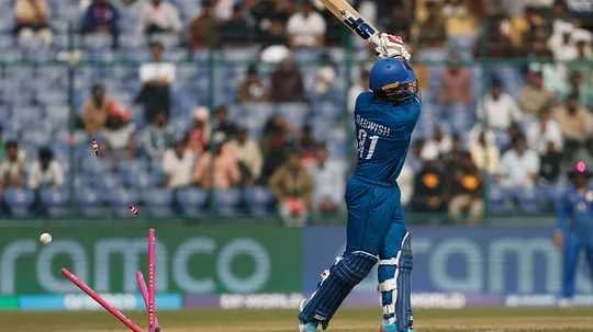 Batter hitting the ball during cricket match Batter hitting the ball during cricket match
