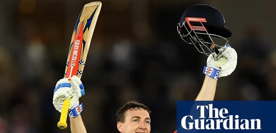 Joueur de cricket célébrant avec une batte levée