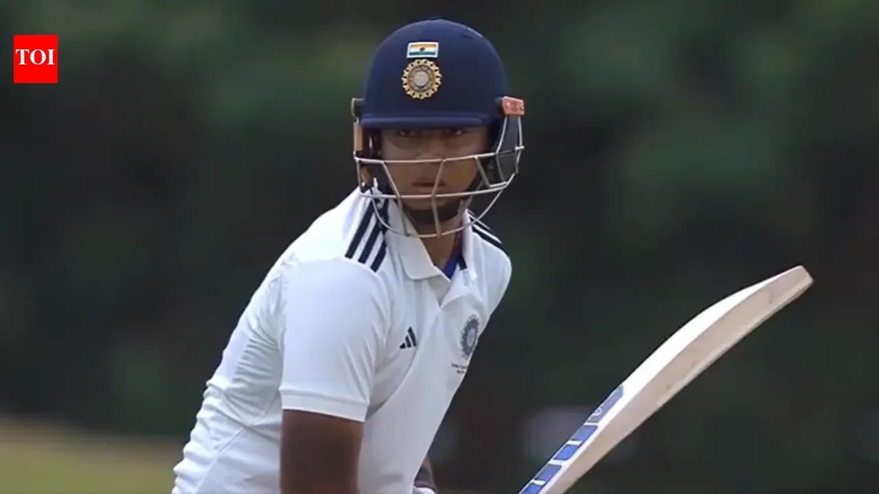 Joueur de cricket prêt à frapper avec sa batte