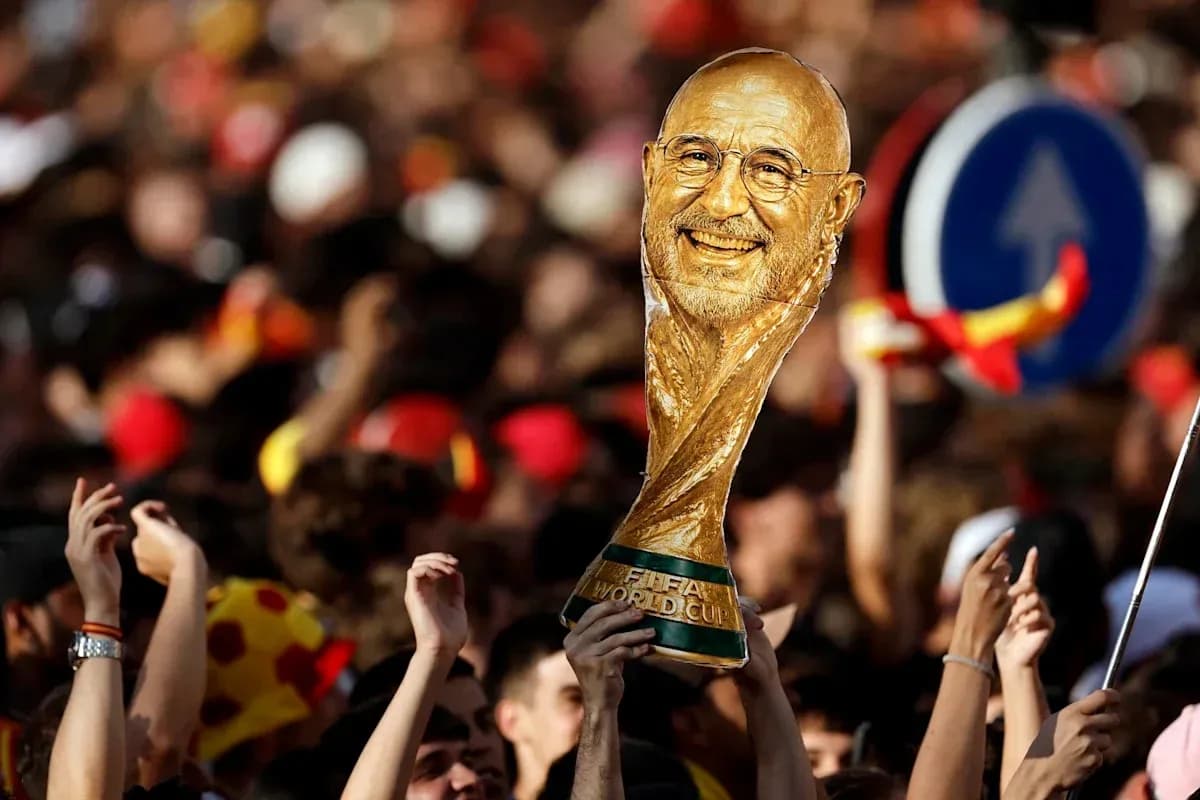 Supporters celebrating with World Cup trophy in crowd