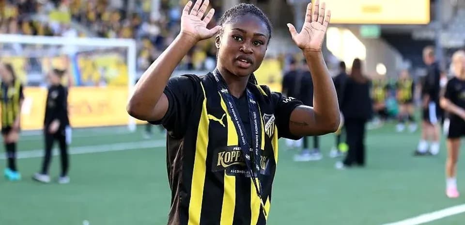 Joueuse saluant les supporters sur le terrain