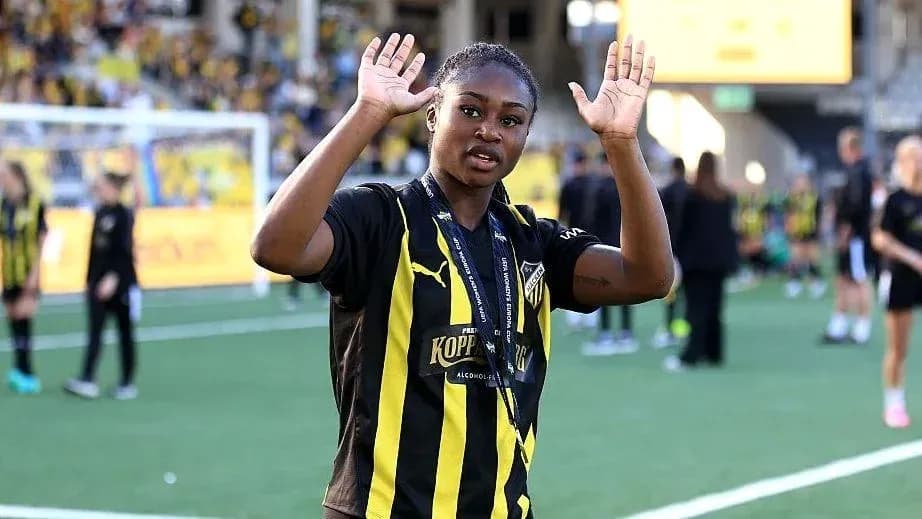 Joueuse saluant les supporters sur le terrain