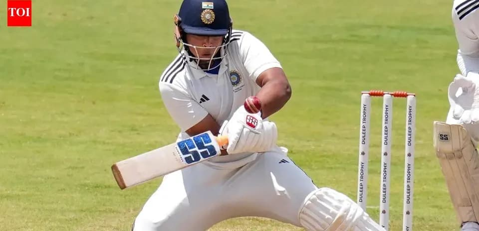 Batteur frappant la balle lors d'un match de cricket