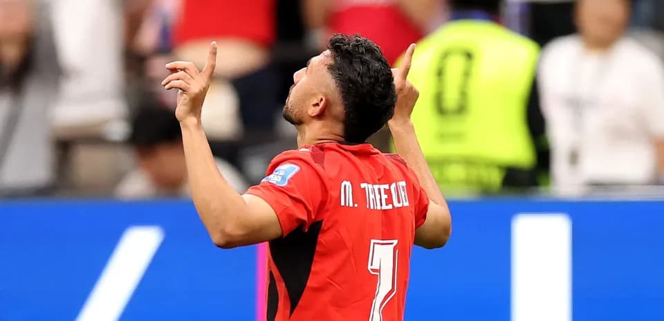 Joueur célébrant un but lors d'un match