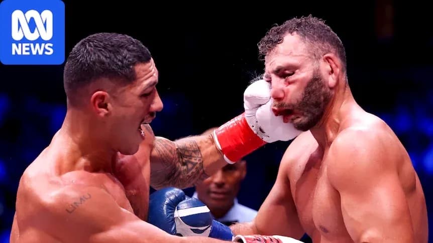 Boxer landing a punch on opponent's face