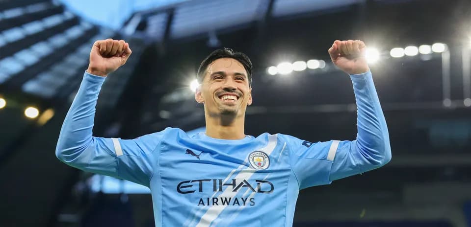 Joueur de Manchester City célébrant une victoire