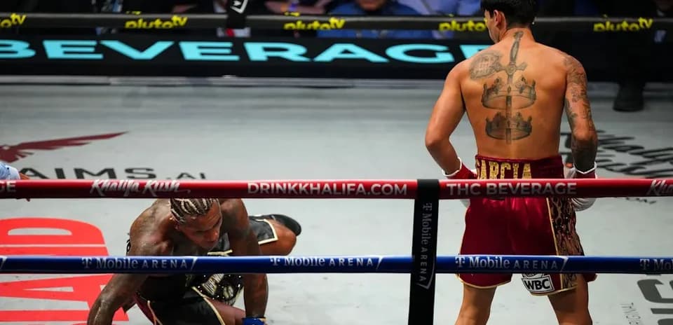 Boxer on the canvas after a knockdown in ring