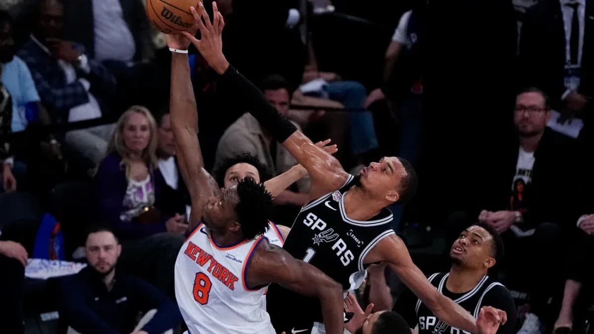 Joueur de New York tentant un tir sous la pression