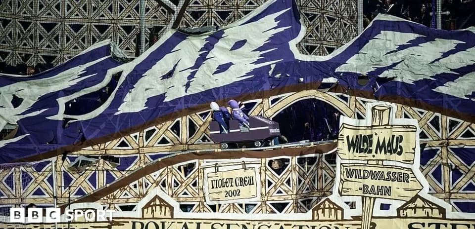 Tifo display featuring roller coaster theme at stadium