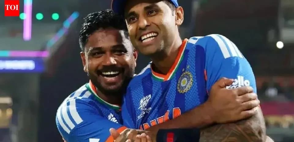 Deux joueurs de cricket célébrant ensemble sur le terrain