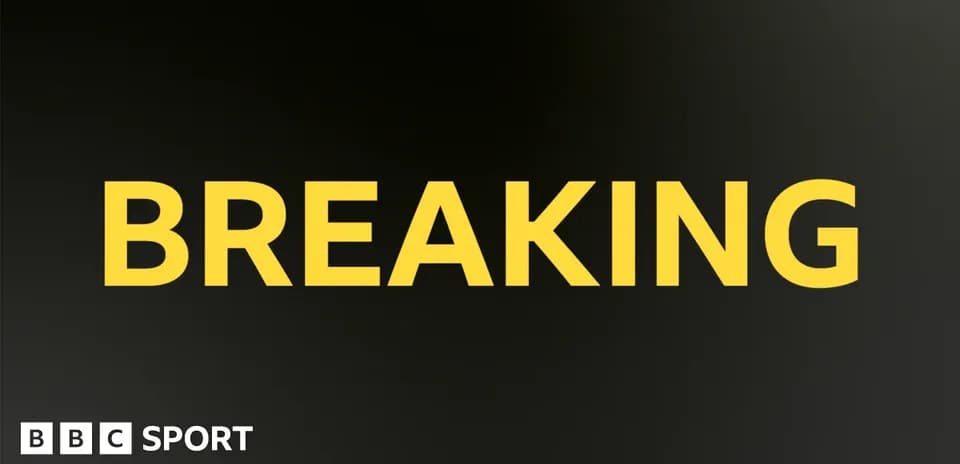 Texte 'BREAKING' sur fond noir