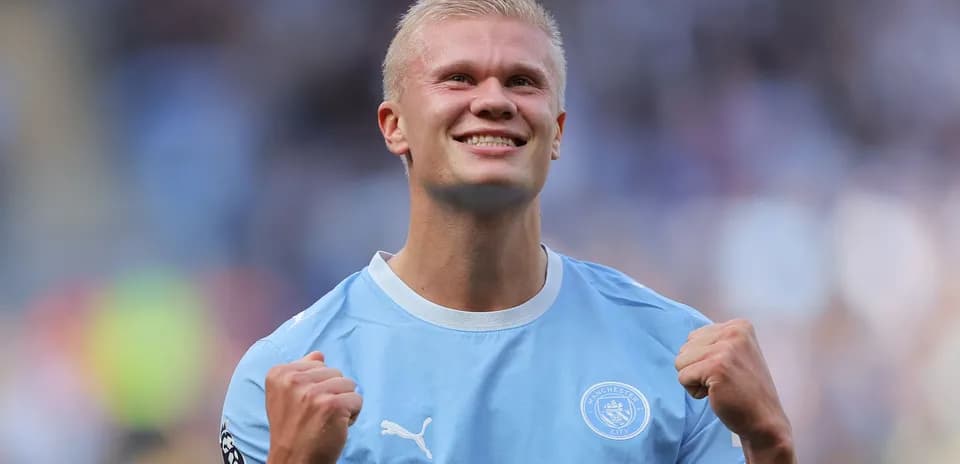 Joueur de Manchester City célébrant avec enthousiasme