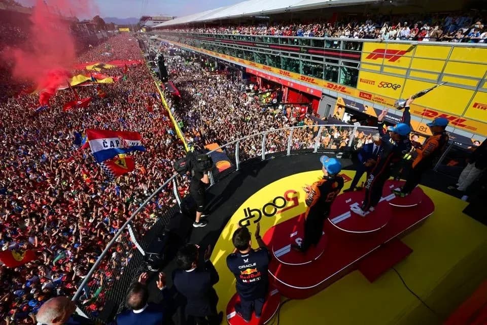 Podium celebration with fans at Formula 1 race