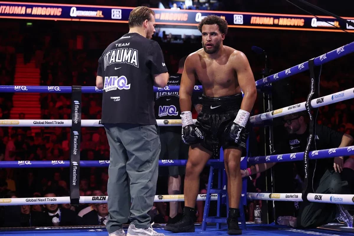 Boxer sitting on stool during corner break
