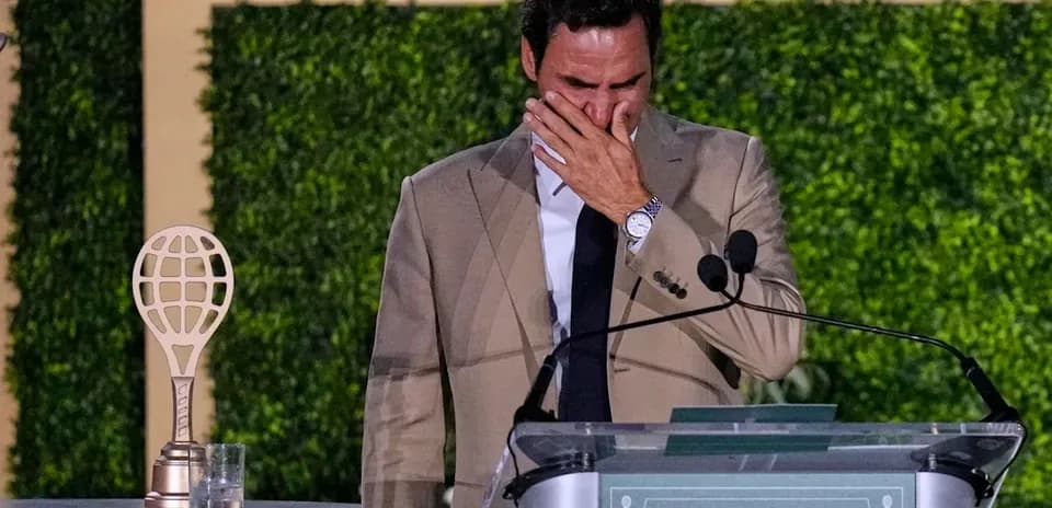 Roger Federer at podium during emotional speech