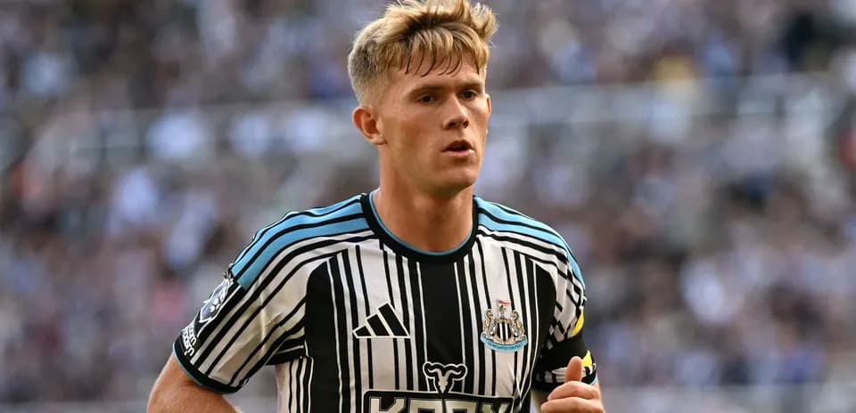 Joueur de Newcastle en action sur le terrain