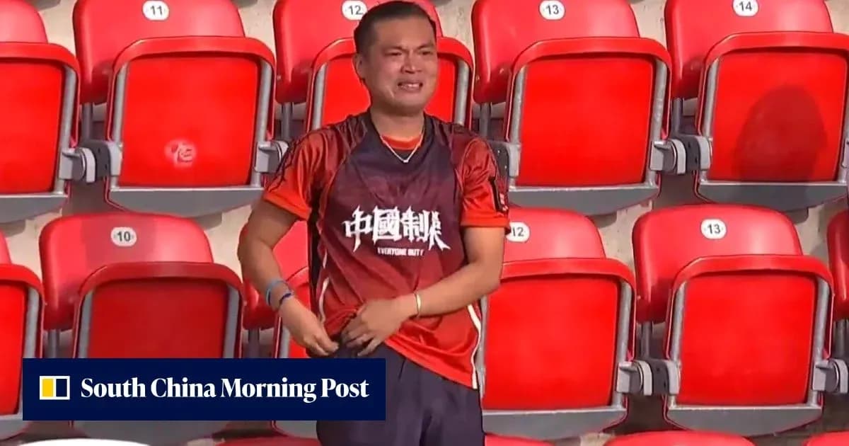 Fan wearing jersey in empty stadium seats