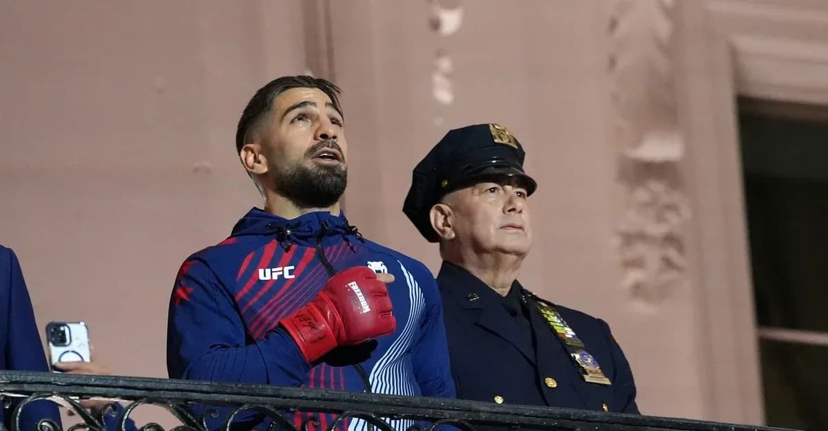 Athlete singing anthem with police officer nearby