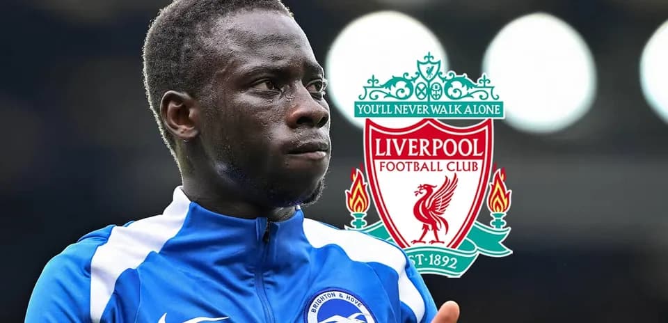 Joueur de Brighton devant le logo de Liverpool