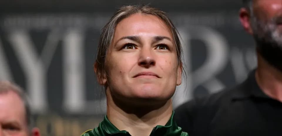 Athlete posing at weigh-in event with serious expression