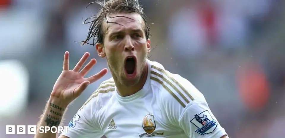 Joueur de Swansea célébrant un but sur le terrain