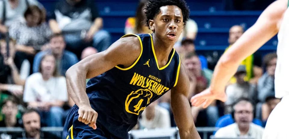 Joueur des Wolverines en action sur le terrain