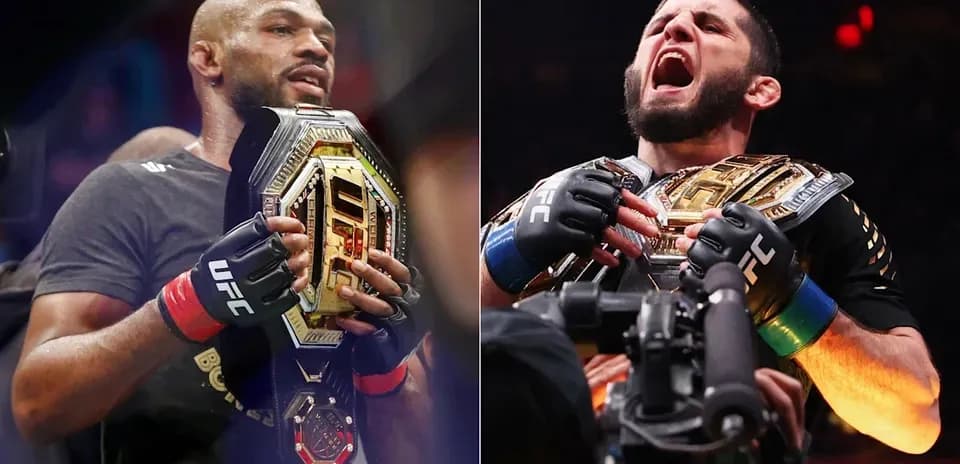 Deux combattants UFC tenant des ceintures de champion