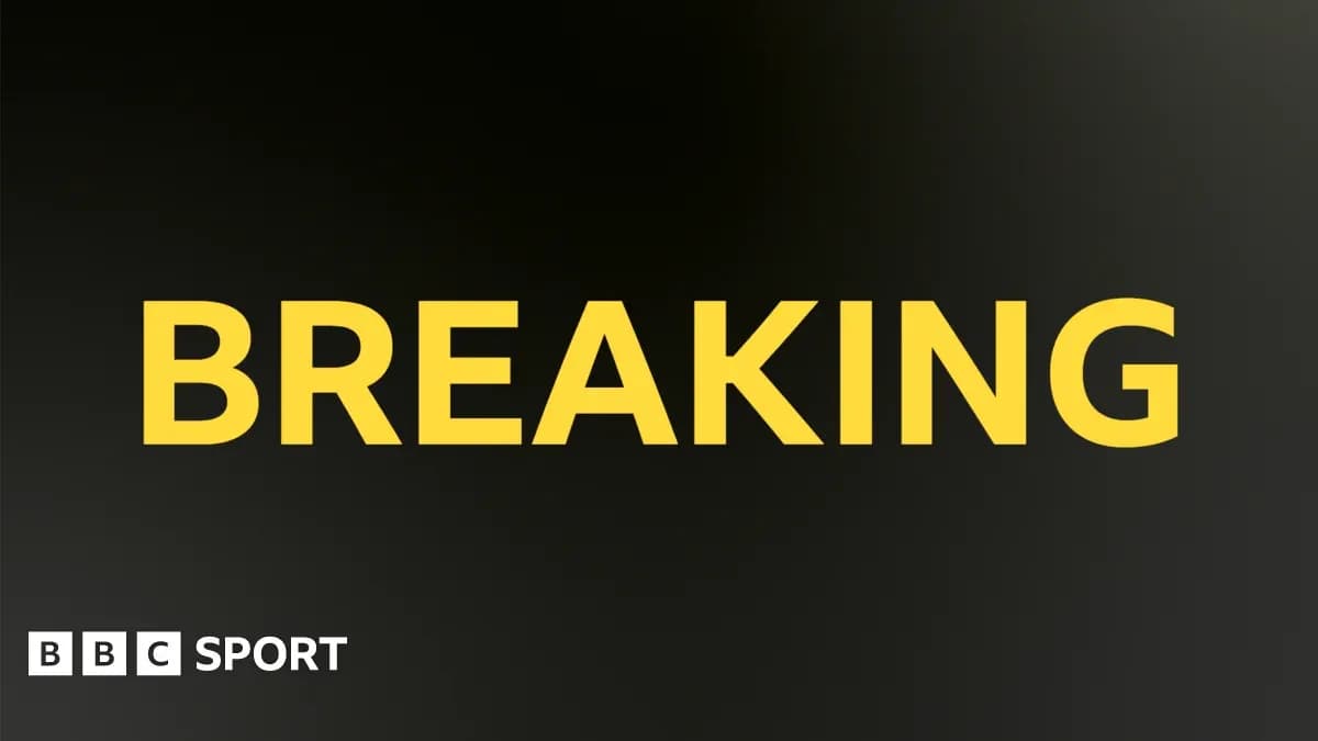 Texte 'BREAKING' en jaune sur fond noir Texte 'BREAKING' en jaune sur fond noir