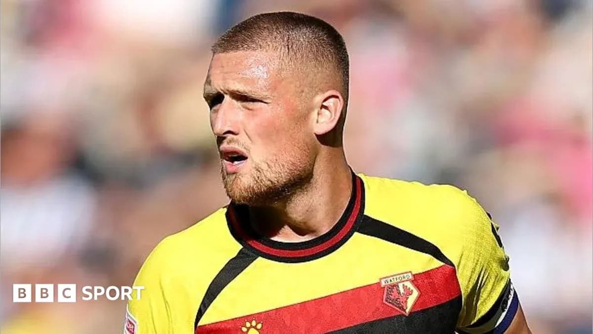 Joueur de Watford sur le terrain pendant un match Joueur de Watford sur le terrain pendant un match