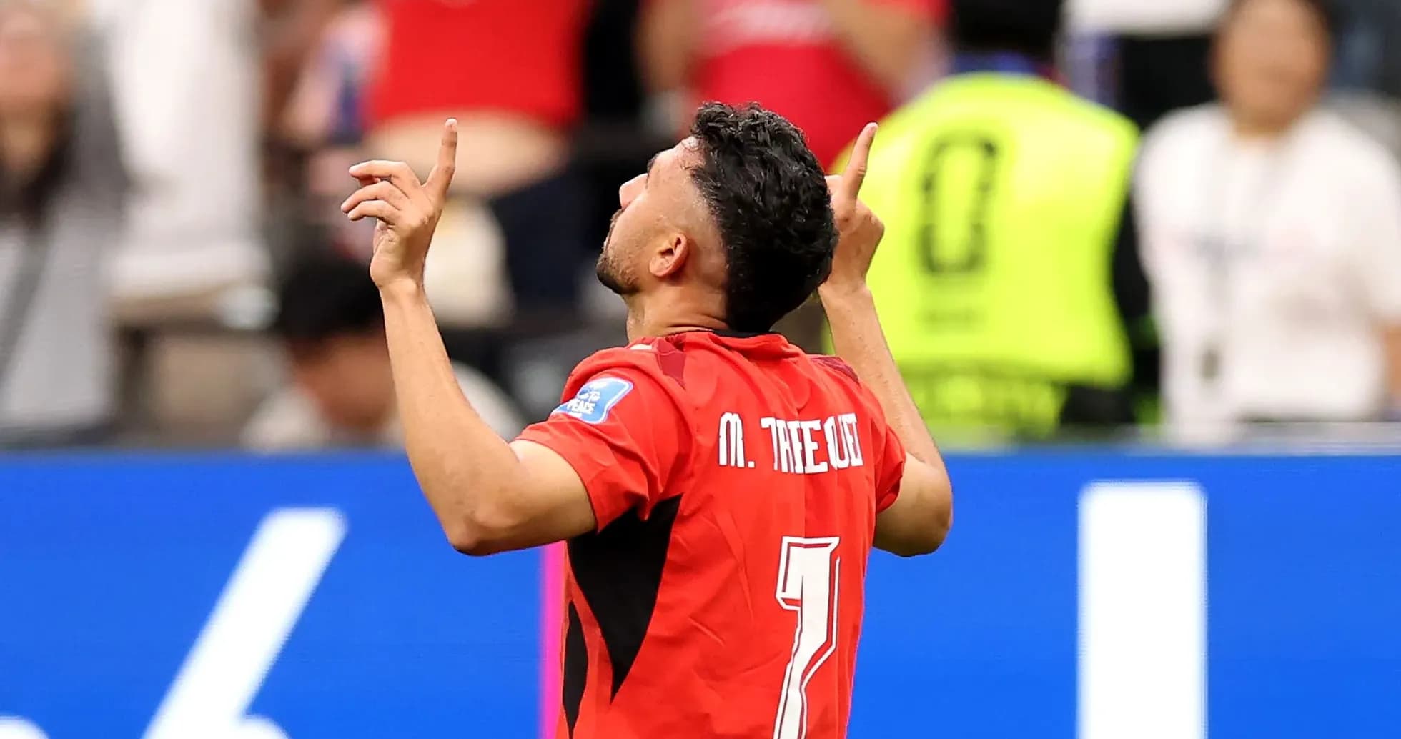 Joueur célébrant un but lors d'un match Joueur célébrant un but lors d'un match