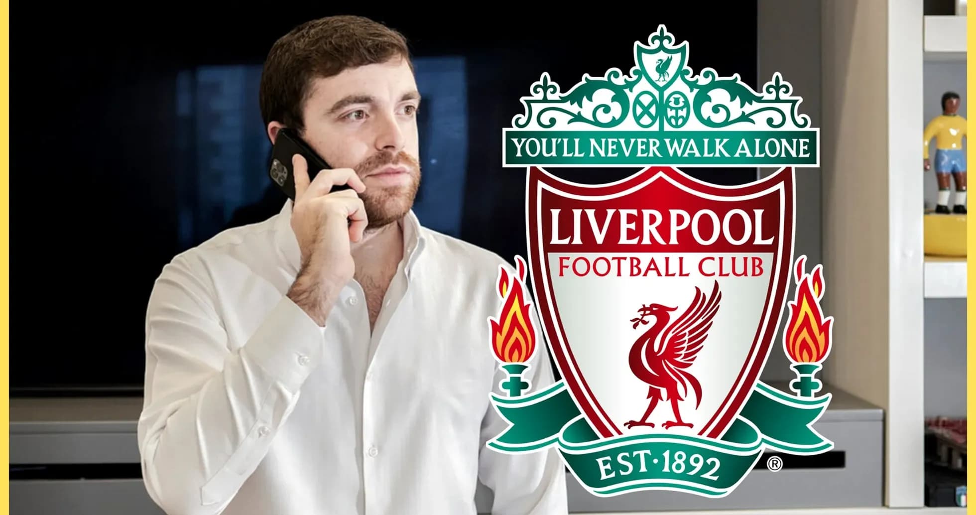 Homme au téléphone avec logo de Liverpool en arrière-plan Homme au téléphone avec logo de Liverpool en arrière-plan