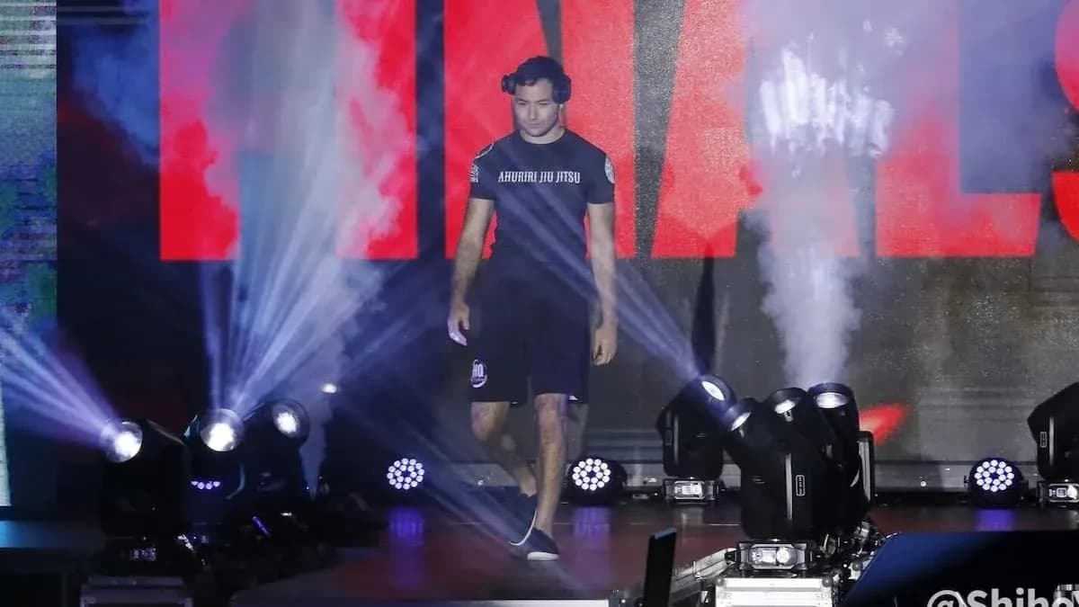 Athlete entering arena during finals with smoke and lights Athlete entering arena during finals with smoke and lights