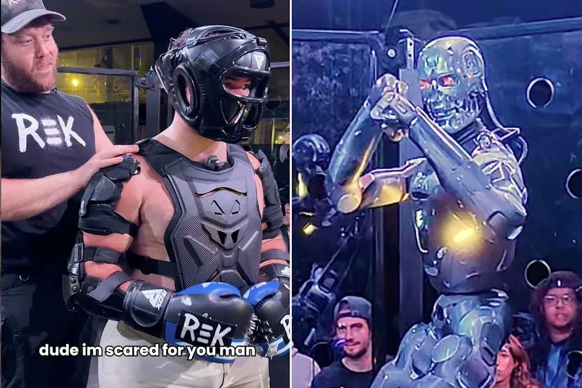 Person in protective gear facing a robotic opponent Person in protective gear facing a robotic opponent