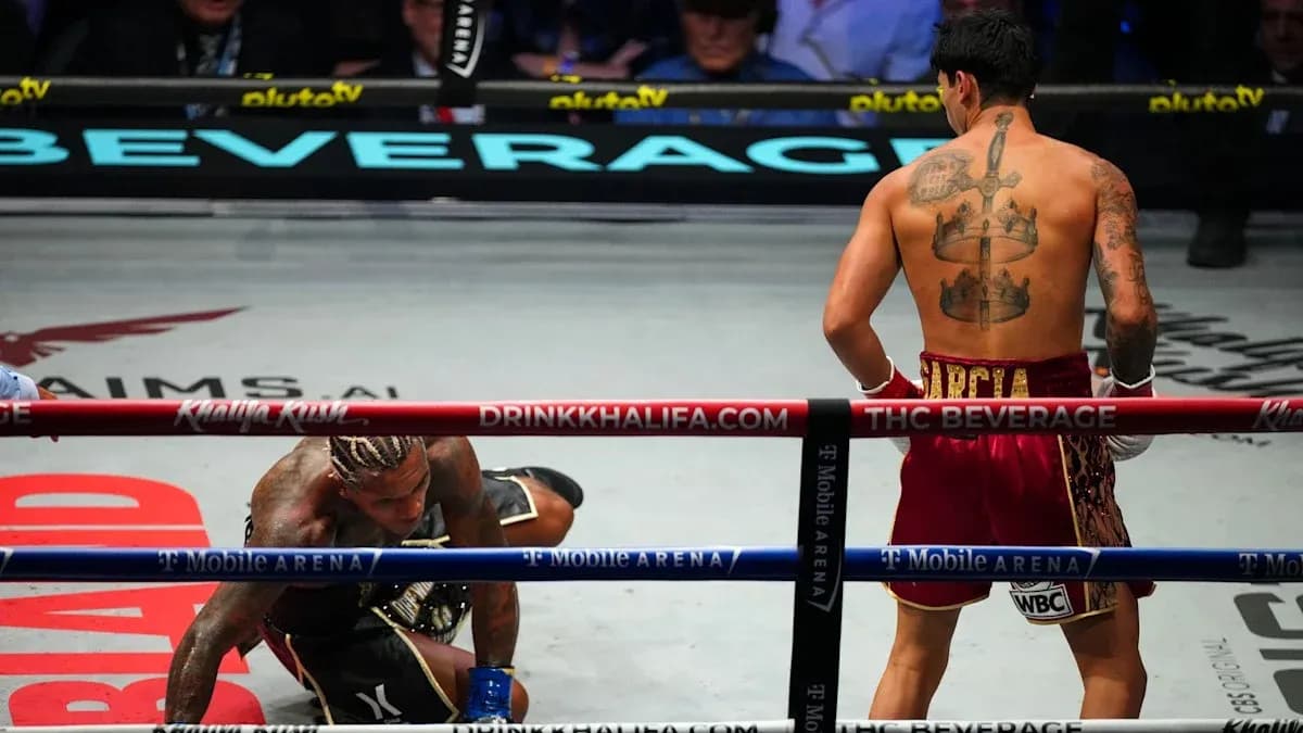 Boxer on the canvas after a knockdown in ring Boxer on the canvas after a knockdown in ring