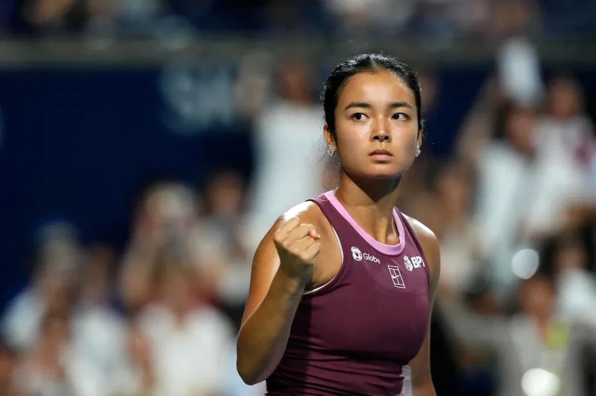Joueuse de tennis célébrant un point gagné Joueuse de tennis célébrant un point gagné