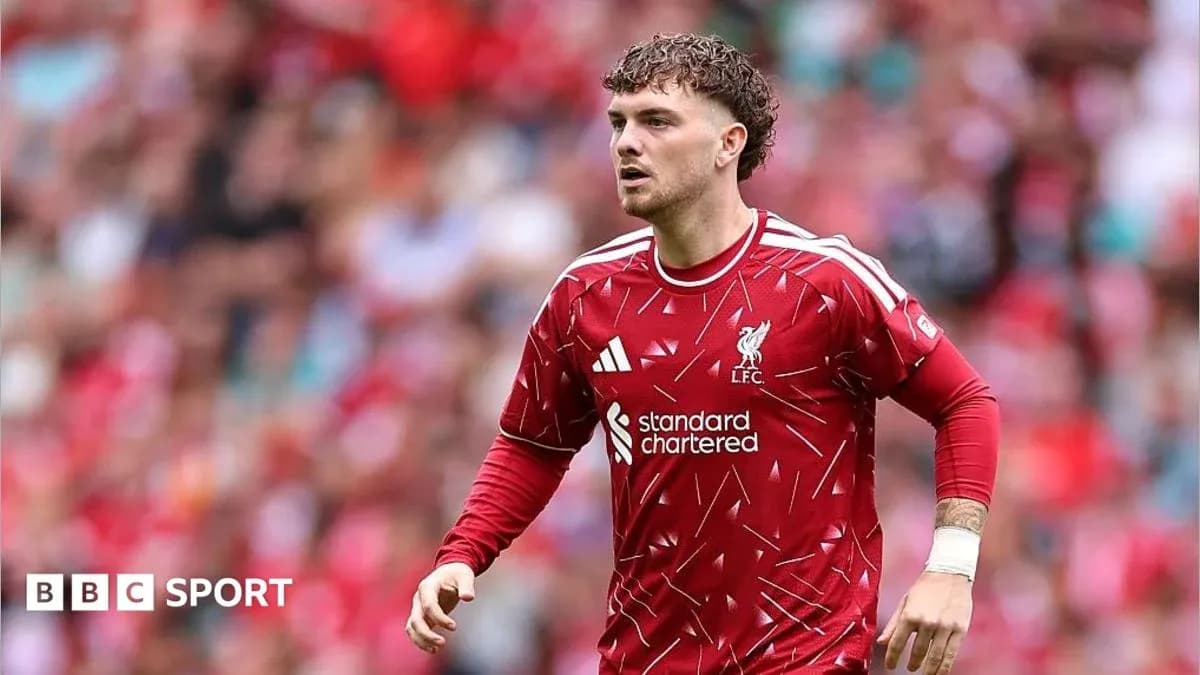 Joueur de Liverpool en action sur le terrain Joueur de Liverpool en action sur le terrain