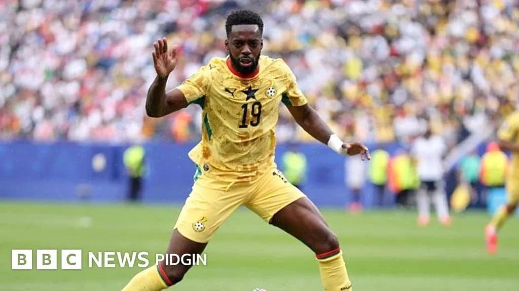 Joueur de Ghana en action pendant un match Joueur de Ghana en action pendant un match
