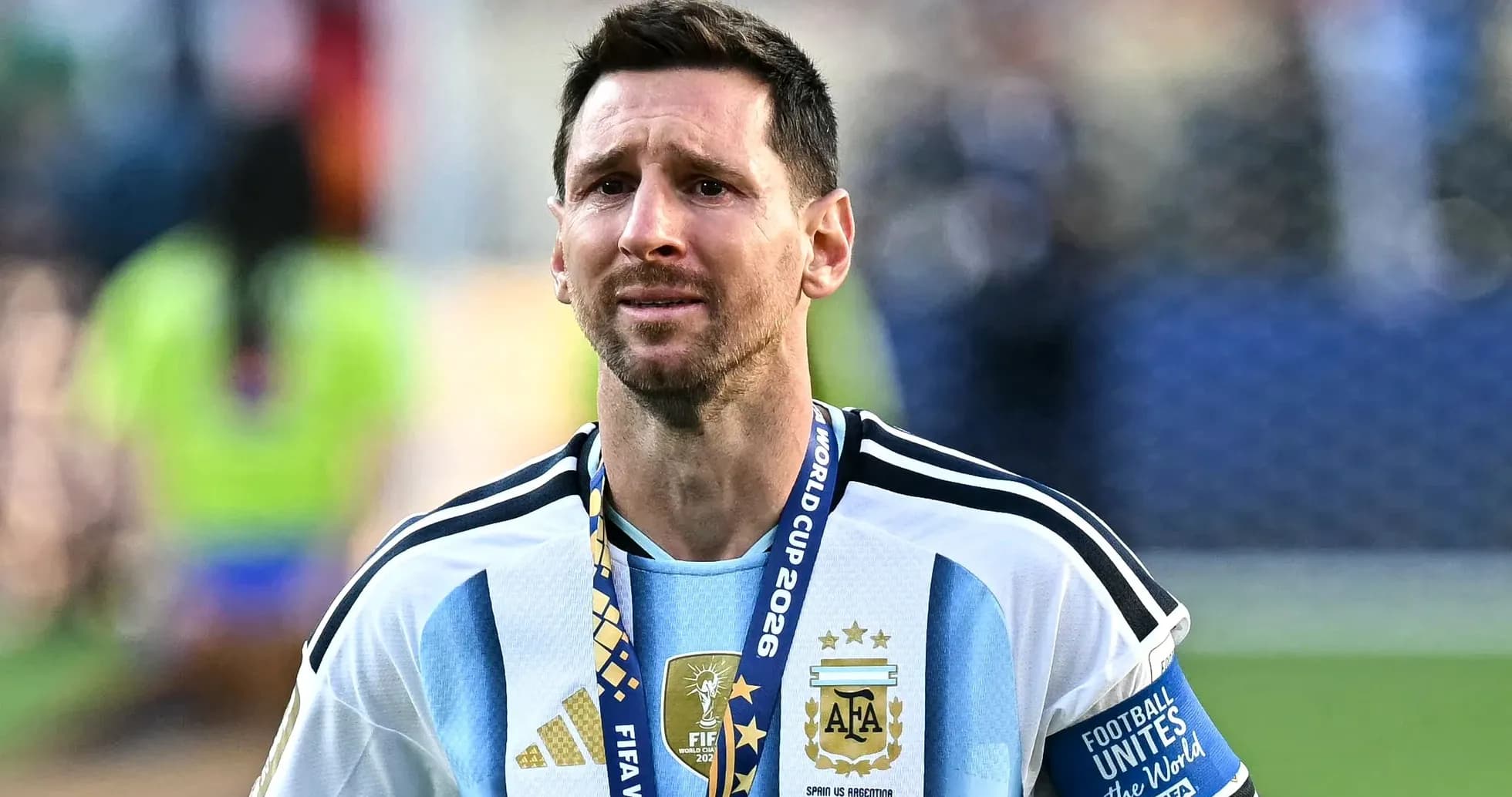 Joueur argentin avec médaille après le match Joueur argentin avec médaille après le match