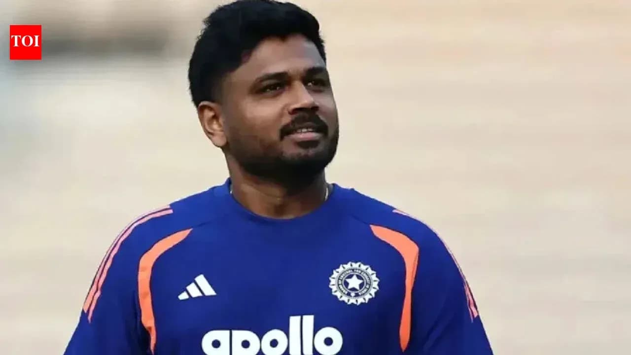 Joueur de cricket en maillot bleu lors d'un entraînement Joueur de cricket en maillot bleu lors d'un entraînement