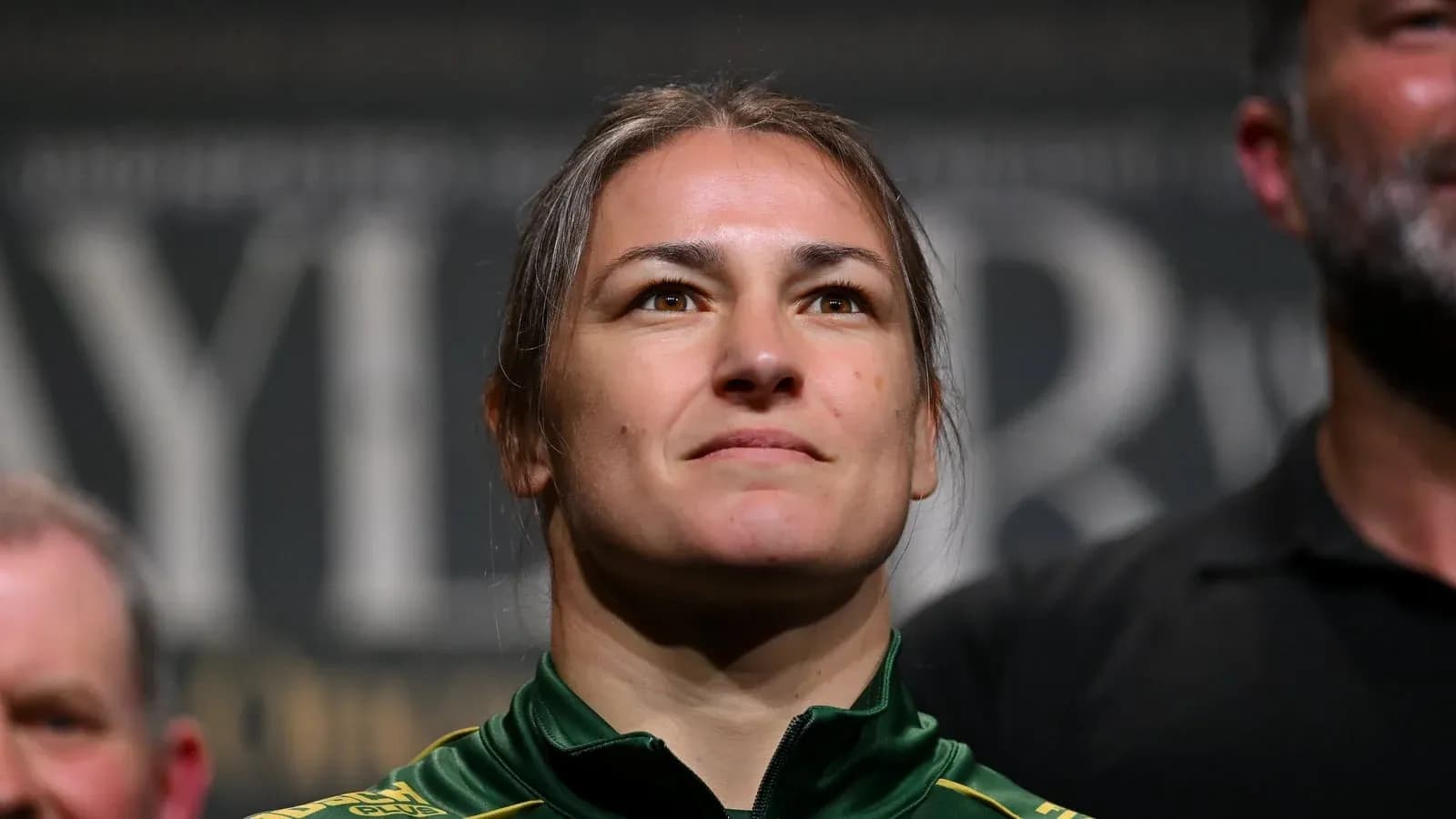 Athlete posing at weigh-in event with serious expression Athlete posing at weigh-in event with serious expression
