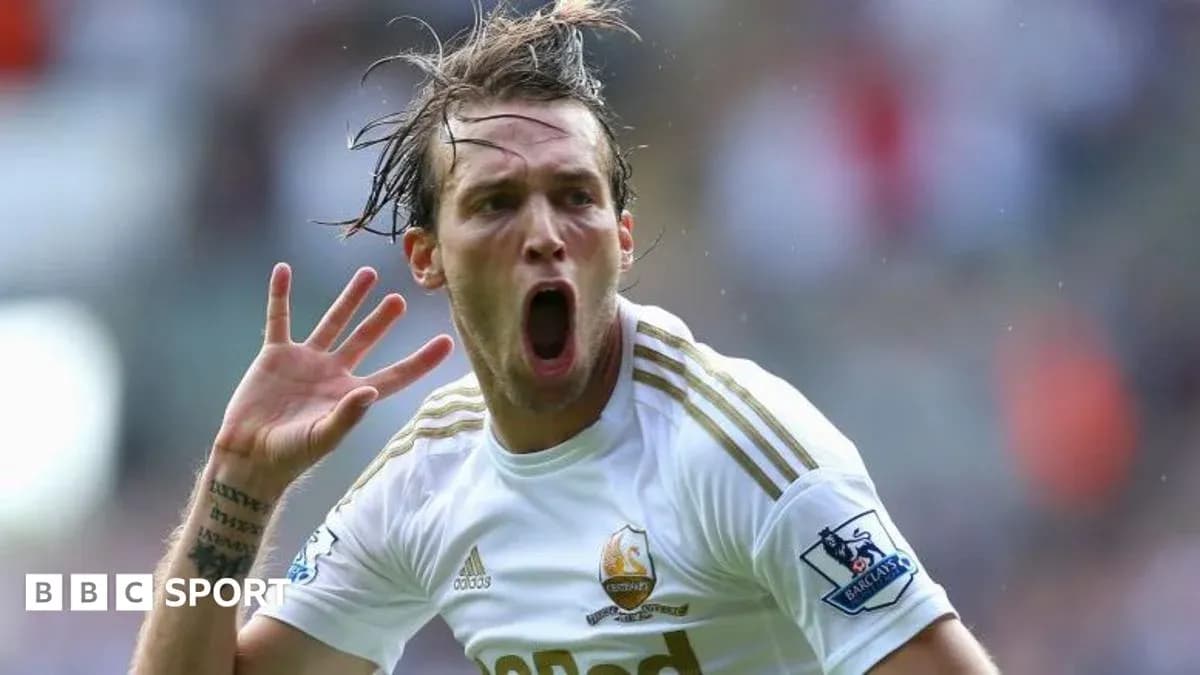 Joueur de Swansea célébrant un but sur le terrain Joueur de Swansea célébrant un but sur le terrain