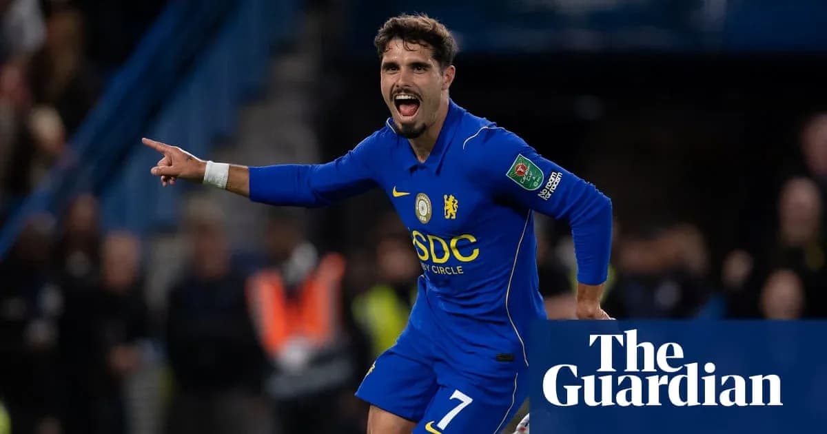 Joueur de Chelsea célébrant un but au stade Joueur de Chelsea célébrant un but au stade